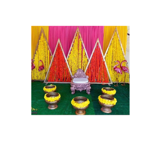 Vibrant Marigold Triangle Haldi Backdrop Setup
